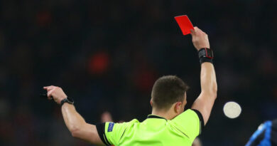 Referee showing a red card