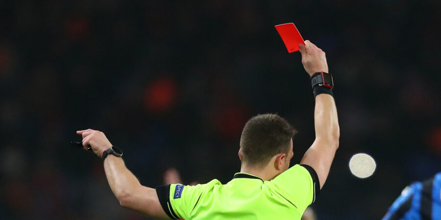 Referee showing a red card