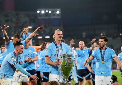 Erling Haaland with the Champions League trophy