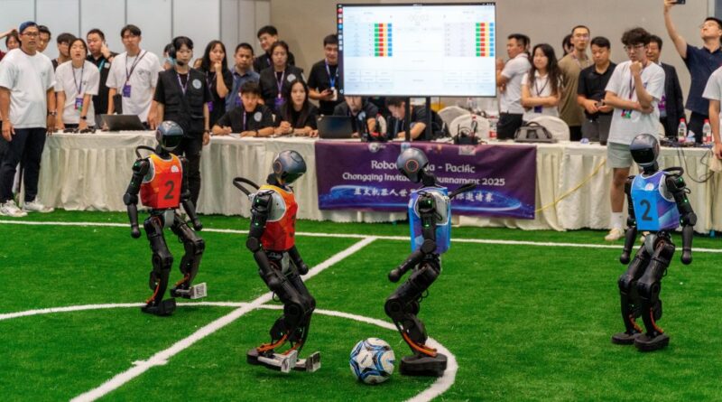 humanroid robots play foot game