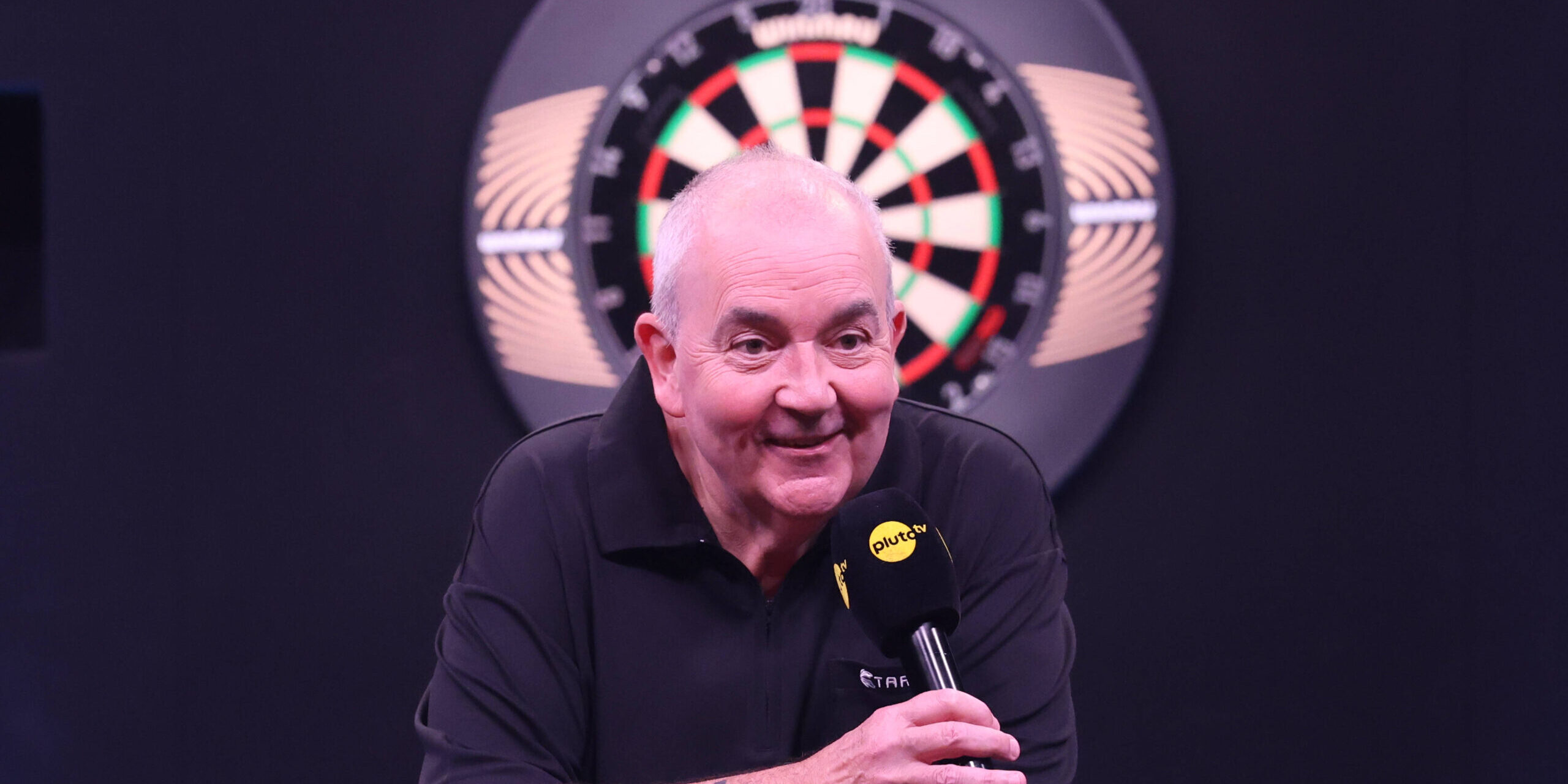 Phil Taylor comes out of retirement for stunning darts return